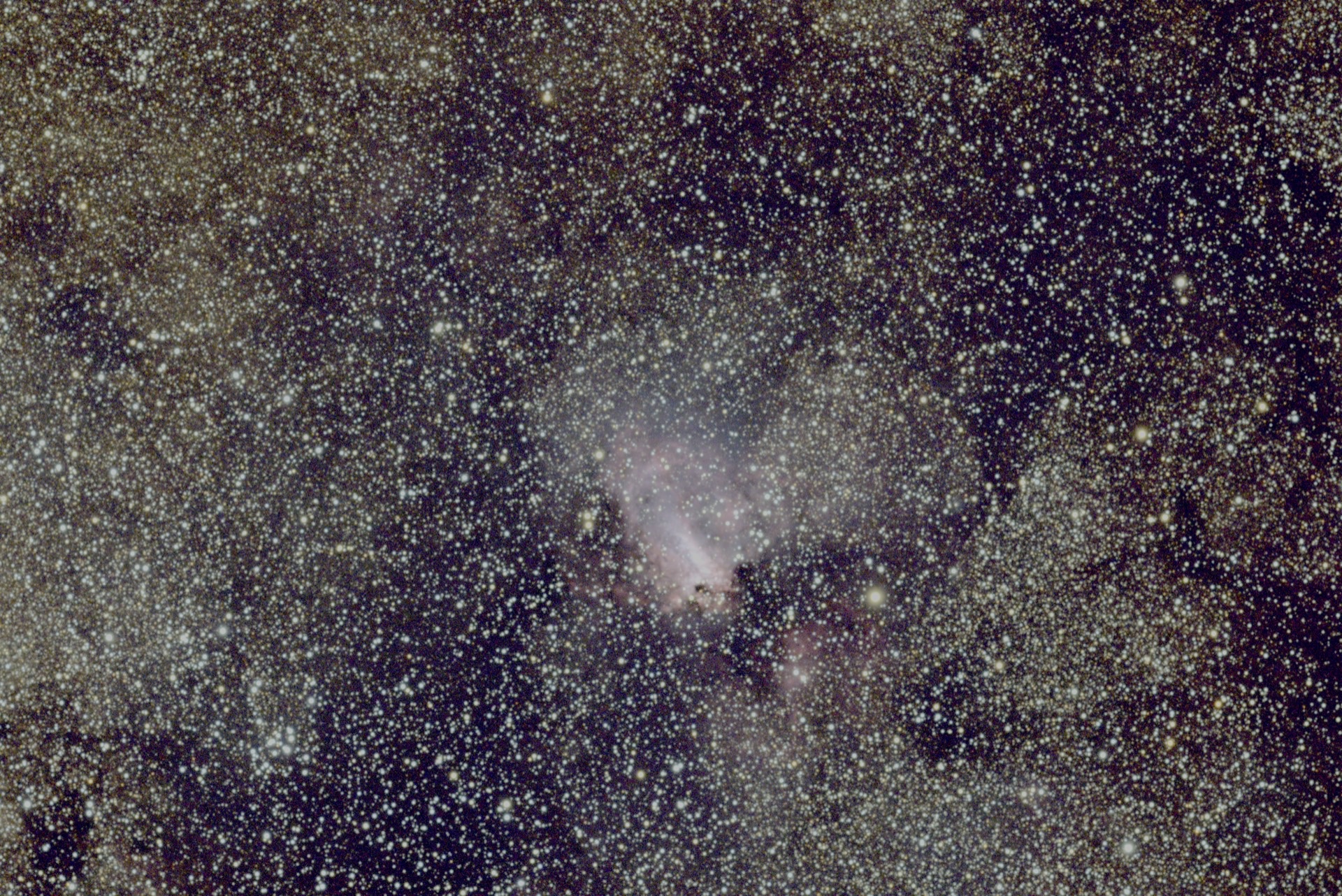 The Omega Nebula, a bright swan-shaped cloud of hydrogen.